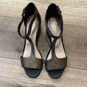 Clarks Women's metallic bronze.